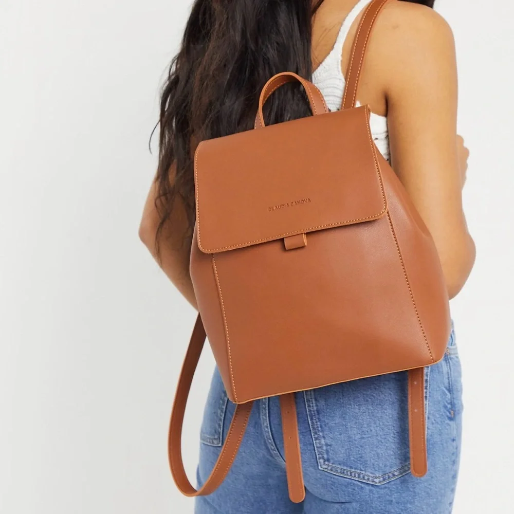 Claudia Canova Unlined Flapover Backpack Tan Faux Leather Minimalist